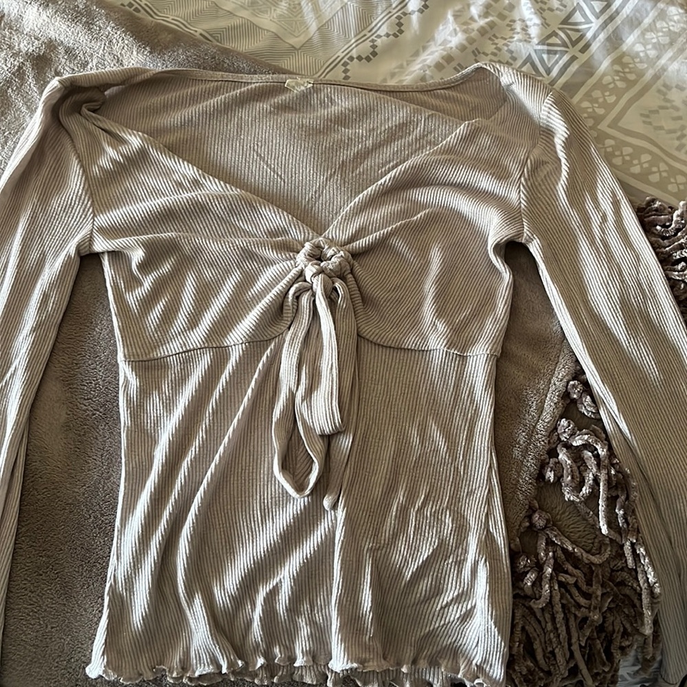 Free People long sleeve cream w/shimmer top. Bell sleeves.